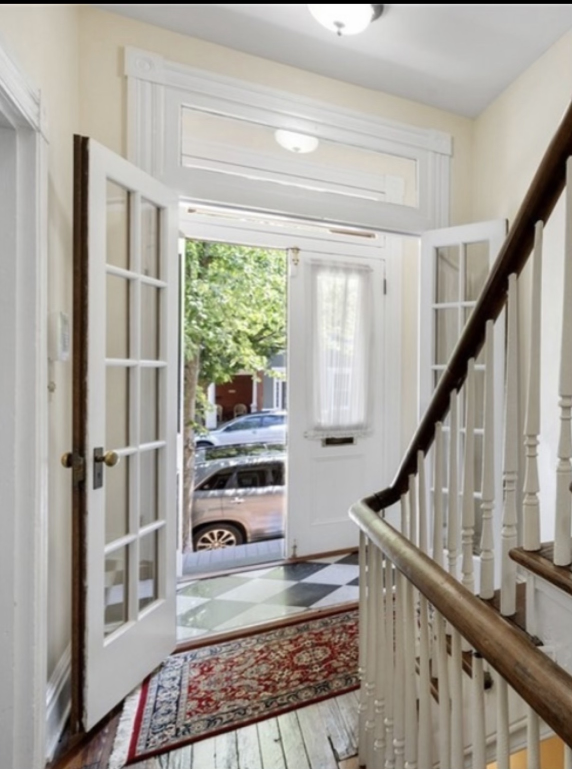 The front vestibule and entry hall before the storage project